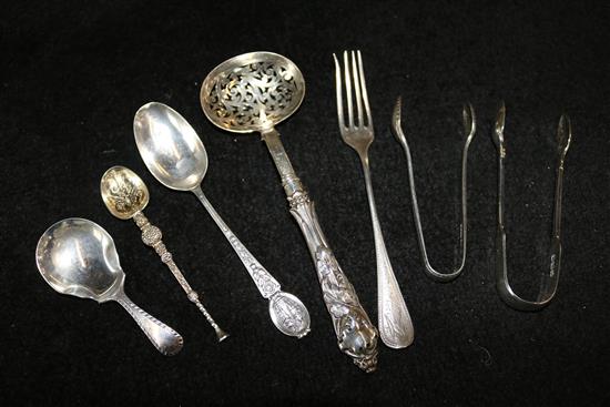 George III caddy spoon, a sifter spoon and 8 other pieces